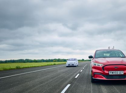 A red and a white car on an AB Dynamics testing track